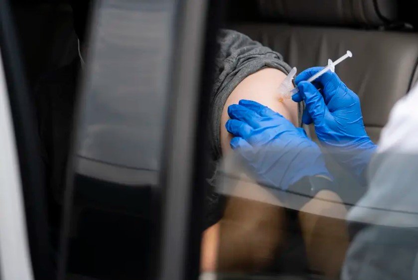 A patient received their first dose of a COVID-19 vaccine at a clinic held in partnership between the Central Texas Food Bank and University of Texas in Austin on July 21, 2021.